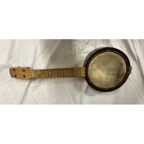 980 - Three ukulele banjos to include a rosewood made in the G.D.R. and a Melody Maker Selcol, Made in Eng... 