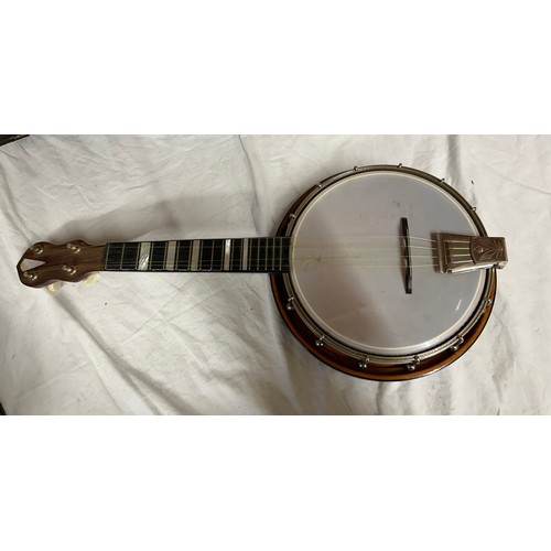 980 - Three ukulele banjos to include a rosewood made in the G.D.R. and a Melody Maker Selcol, Made in Eng... 