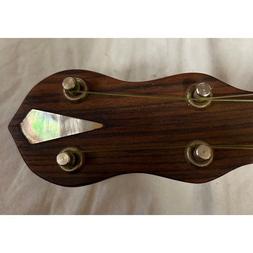 980 - Three ukulele banjos to include a rosewood made in the G.D.R. and a Melody Maker Selcol, Made in Eng... 