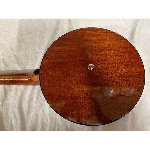 980 - Three ukulele banjos to include a rosewood made in the G.D.R. and a Melody Maker Selcol, Made in Eng... 