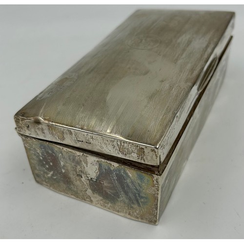 825 - Hallmarked silver : a machine turned rectangular cigarette box with initials and wooden interior 18.... 