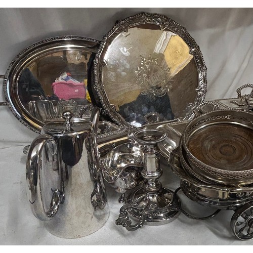 753 - A large quantity of good quality silverplated items to include a large footed tray by Walker and Hal... 