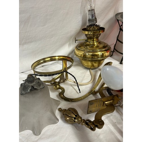 1030 - A collection of vintage lighting parts to include an electrified oil lamp together with a brass door... 