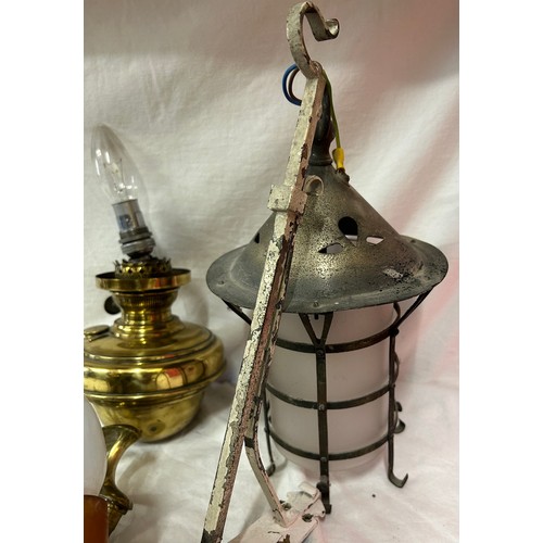 1030 - A collection of vintage lighting parts to include an electrified oil lamp together with a brass door... 