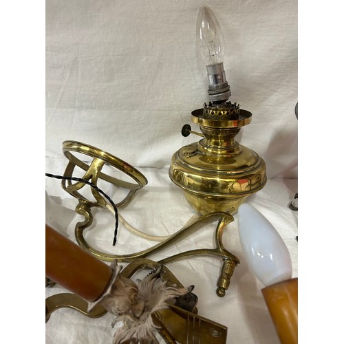 1030 - A collection of vintage lighting parts to include an electrified oil lamp together with a brass door... 