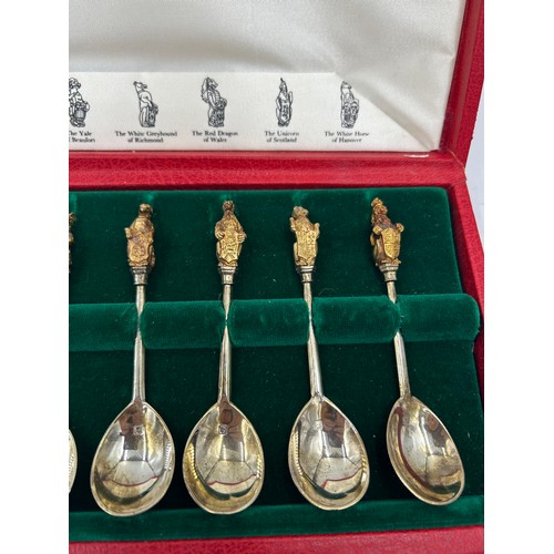 827 - The Queen's Beasts - a cased set of ten hallmarked silver spoons, William Comyns & Sons Ltd, London ... 