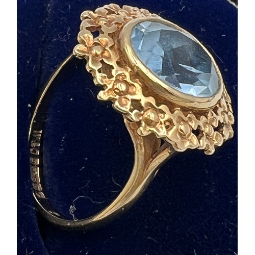 587 - A nine carat gold ring set with pale blue stone, size M, weight 3.2gm.