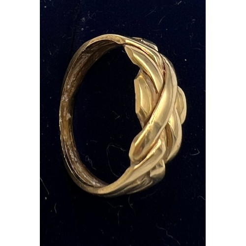 591 - A yellow metal ring with marks rubbed. Size M. Weight 3.5gm.