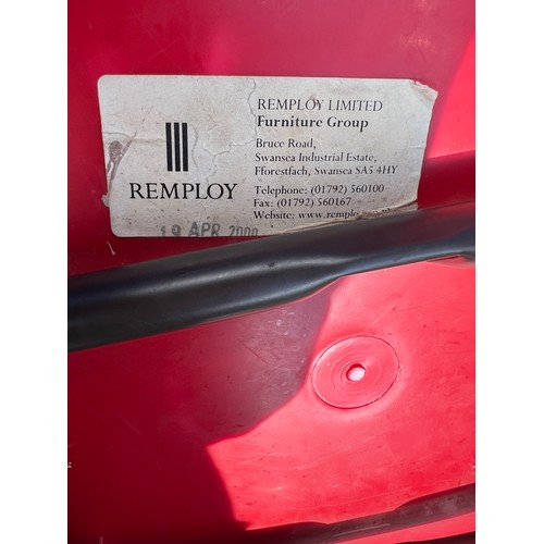 22 - A set of four Remploy children’s chairs in red plastic on tubular steel frames. Bearing original Rem... 