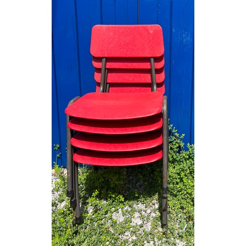 22 - A set of four Remploy children’s chairs in red plastic on tubular steel frames. Bearing original Rem... 