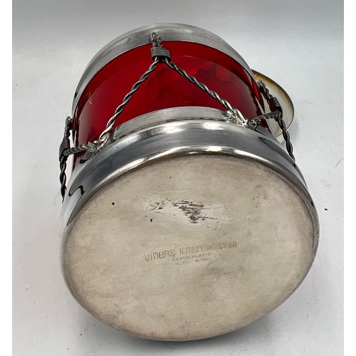 24 - A Viners International ruby glass lined preserve jar in the form of a drum with silver plated frame ... 