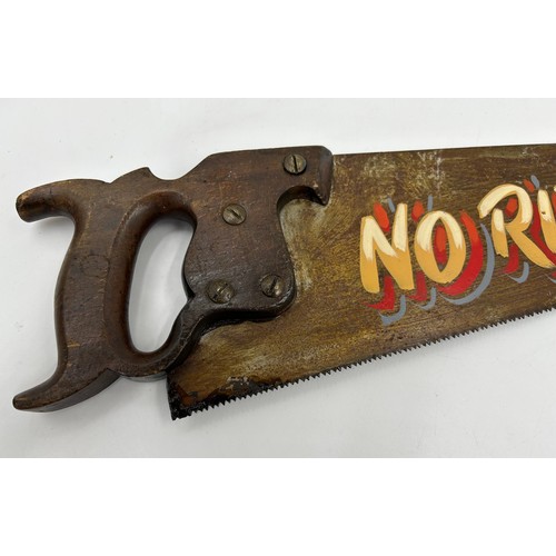 35 - A vintage saw hand painted with ‘ No Riff Raff!’ Length 64cm.