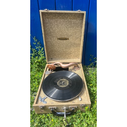 113 - A vintage Wondertone gramophone complete with Al Jolson record. 39cm x 30cm x 16cm.