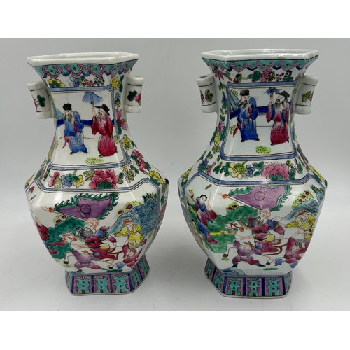 117 - A pair of Chinese porcelain vases with polychrome decoration depicting immortals, birds and flowers.... 