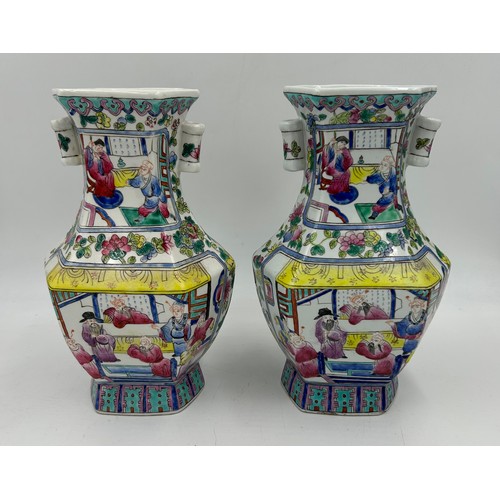 117 - A pair of Chinese porcelain vases with polychrome decoration depicting immortals, birds and flowers.... 