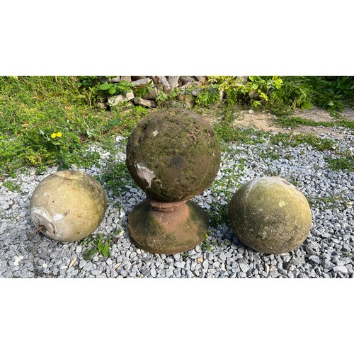 221 - An early hand hewn stone petrosphere, diameter 24cm, height 40cm on integral stand together with a p... 