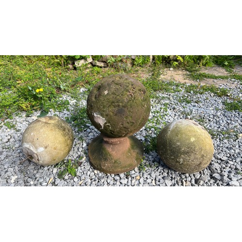 221 - An early hand hewn stone petrosphere, diameter 24cm, height 40cm on integral stand together with a p... 