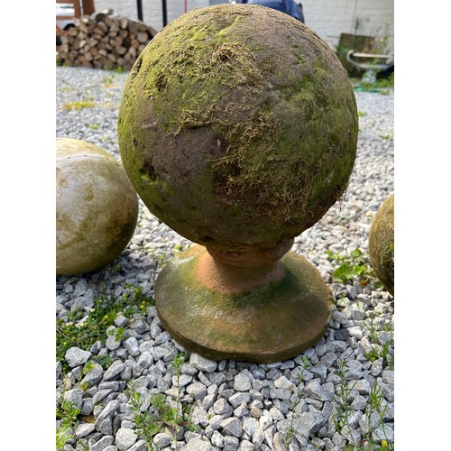 221 - An early hand hewn stone petrosphere, diameter 24cm, height 40cm on integral stand together with a p... 