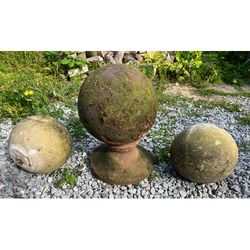 221 - An early hand hewn stone petrosphere, diameter 24cm, height 40cm on integral stand together with a p... 