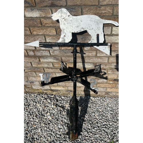 175 - A metal weather vane with dog to the top. Height approximately  76cm.