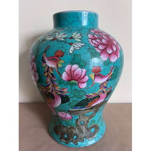 944 - A large 19thC Chinese vase with famille rose decoration, possibly Jiaqing, green ground with exotic ... 