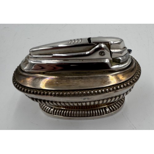 823 - A Silver Inkwell marked George Nathan & Ridley Hayes Birmingham 1906 with hinged lid, 9cm h x 11 cm ... 