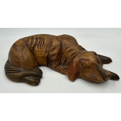 1342 - A collection of wooden carved items to include a sleeping dog, a duck, a mahogany bowl, an oak bowl,... 