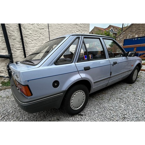 1 - A Ford Escort Mark IV (Erica Model) Mistal Blue 1986. Engine No. 00001, Chassis no. 00001. 

Origina... 