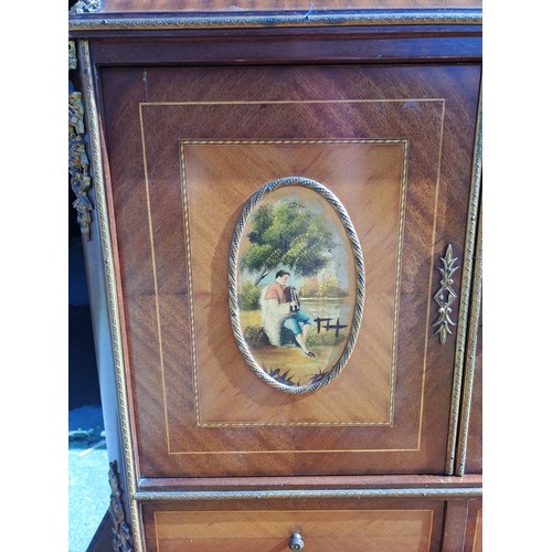 137 - French style desk with inlaid and painted decoration on cabriole legs with gilt metal mounts. 133cm ... 