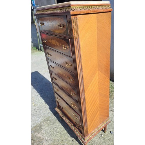 138 - A French style chest of eight drawers with floral inlay and marble top. 129cm h x 51cm w x 32cm d.