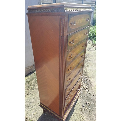 138 - A French style chest of eight drawers with floral inlay and marble top. 129cm h x 51cm w x 32cm d.