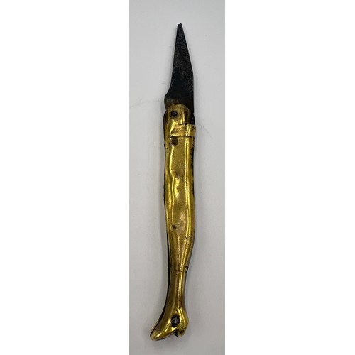 210 - A Georgian brass cased pocket knife in the form of a ladies leg in a heeled boot with a forged steel... 