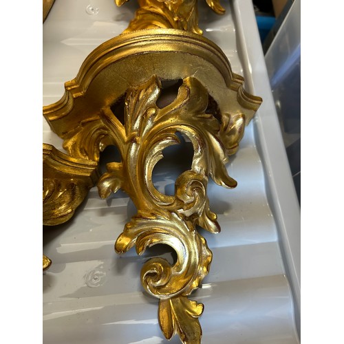 1271 - Four decorative gilt wall mounted brackets. 22cm h.