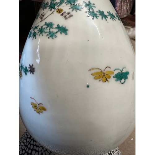 939 - A Chinese polychrome porcelain bottle vase. 29cm h.