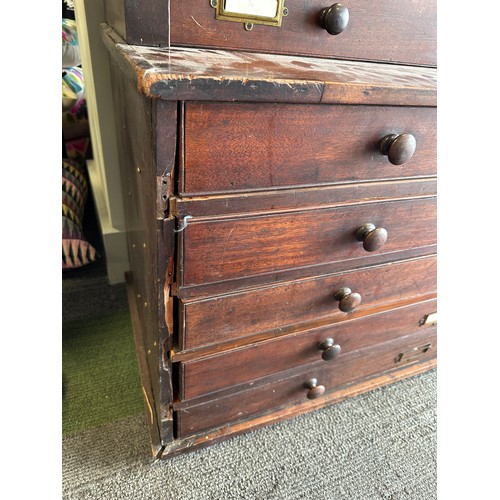 48 - A 19thC mahogany collectors cabinet with wooden knobs. Ten drawers to top over five long drawers to ... 