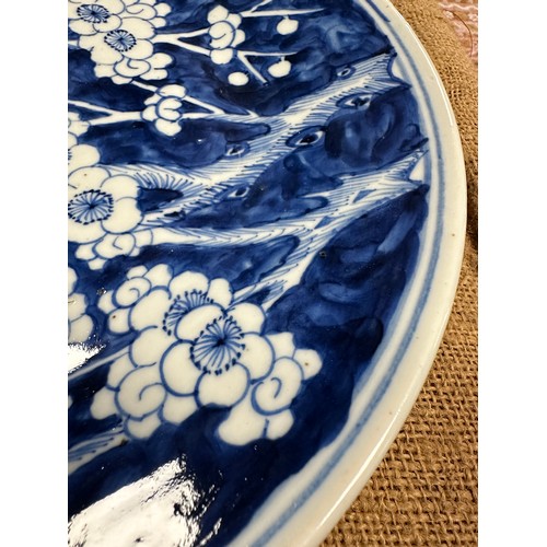 942 - Two 19thC Chinese blue & white plates in 'Prunus Hawthorne' Pattern 30cm diameter.