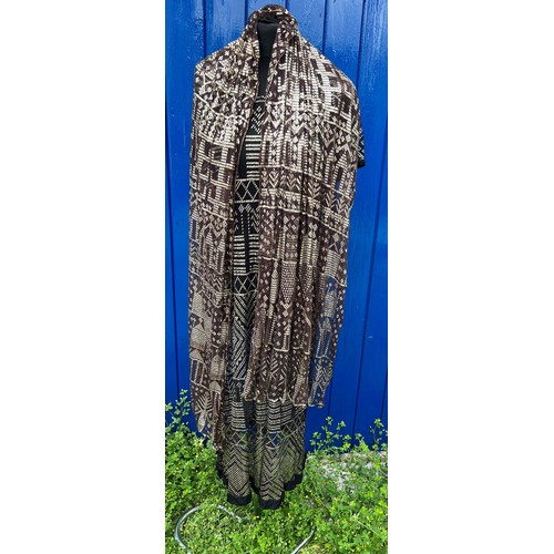 952 - A Egyptian Assuit shawl made into a dress, together with similar shawl on brown net. Measurements of... 