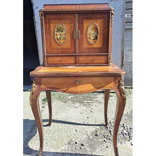 30 - French style desk with inlaid and painted decoration on cabriole legs with gilt metal mounts. 133cm ... 