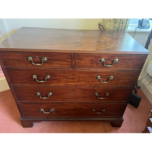 35 - A 19thC mahogany chest of two short over three long drawers with brass swan necked drop handles and ... 