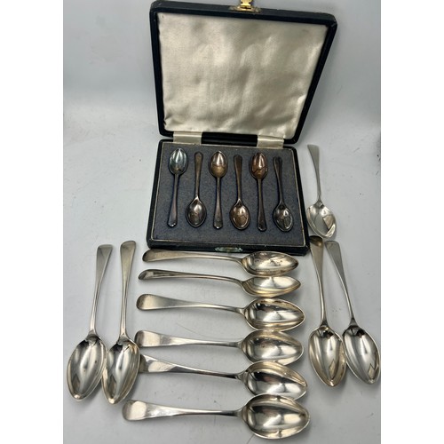 876 - A boxed set of six silver spoons Sheffield 1944 together with eleven teaspoons, Sheffield 1908 and a... 