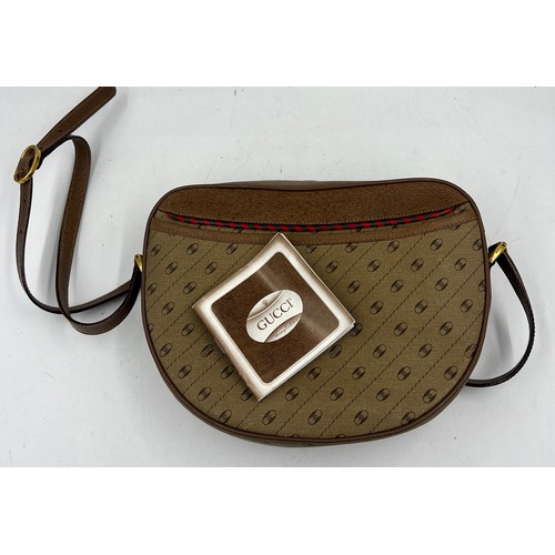 954 - A vintage Gucci shoulder bag. 24cm x 17cm.