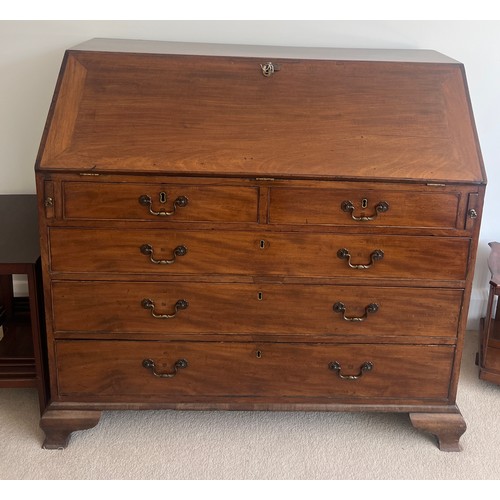 41 - A 19thC mahogany bureau on ogee bracket feet and fitted interior. 111cm w x 53cm d x 106cm h.