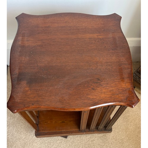 42 - An oak table top revolving bookcase. 39cm h x 36cm x 36cm.