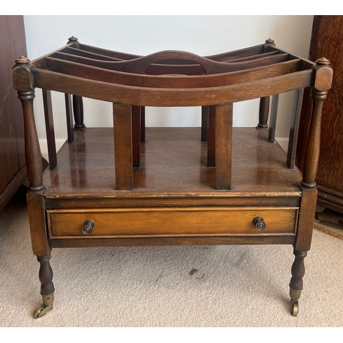 43 - A mahogany Canterbury on brass castors with drawer to front. 50cm w x 36cm d x 47cm h.