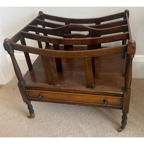 43 - A mahogany Canterbury on brass castors with drawer to front. 50cm w x 36cm d x 47cm h.