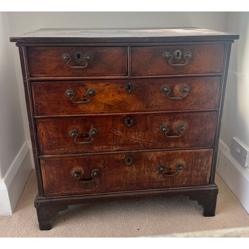 45 - An early 19thC chest of drawers with two short over three long drawers and brass swan necked handles... 