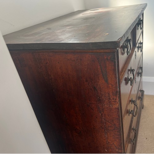 45 - An early 19thC chest of drawers with two short over three long drawers and brass swan necked handles... 