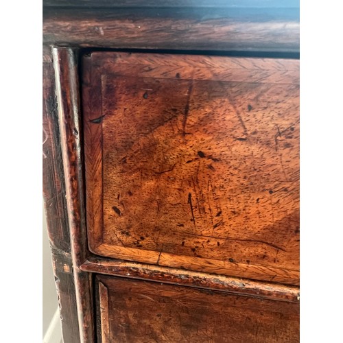 45 - An early 19thC chest of drawers with two short over three long drawers and brass swan necked handles... 