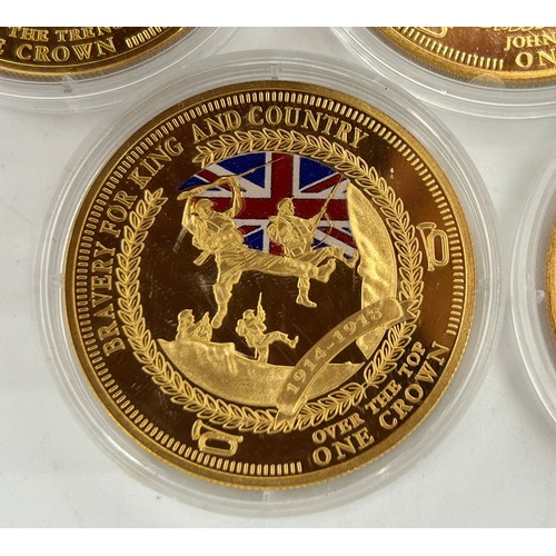 779 - A large quantity of gold plated proof coins/medallions to include 5 x 2014 WW1 Centenary, 4 x one do... 