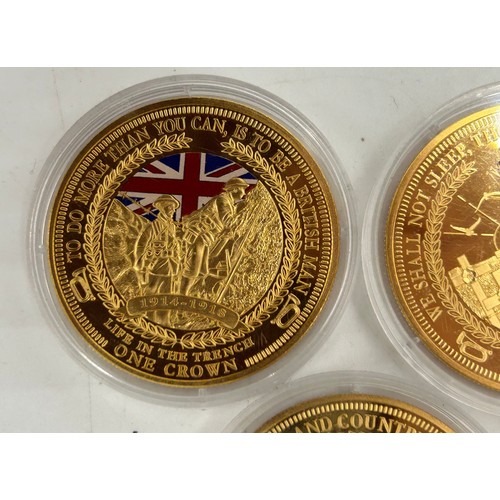 779 - A large quantity of gold plated proof coins/medallions to include 5 x 2014 WW1 Centenary, 4 x one do... 